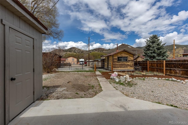 604 W 1st St, Salida, CO 81201 - view of yard featuring fence and a mountain view