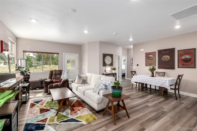 12673 Tamarac St, Thornton, CO 80602 - living room with wood finished floors and recessed lighting