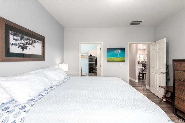 12673 Tamarac St, Thornton, CO 80602 - bedroom featuring wood finished floors and a spacious closet
