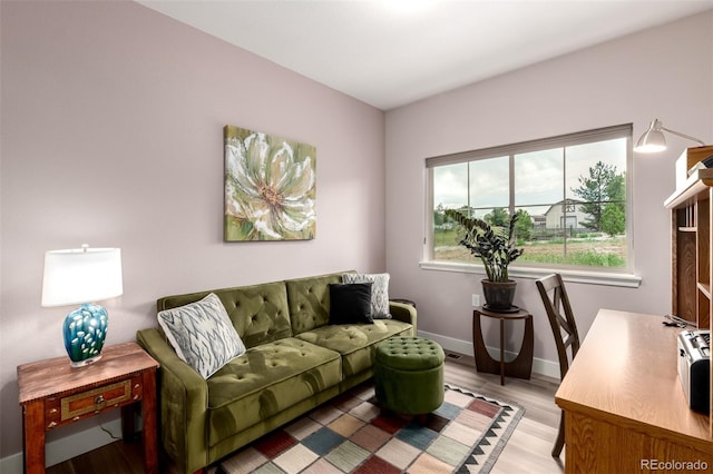 12673 Tamarac St, Thornton, CO 80602 - living area with light wood finished floors and baseboards