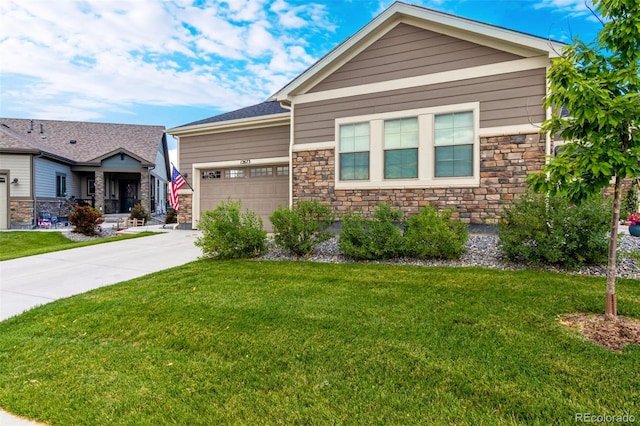 12673 Tamarac St, Thornton, CO 80602 - craftsman-style home with a garage, a front lawn, concrete driveway, and stone siding