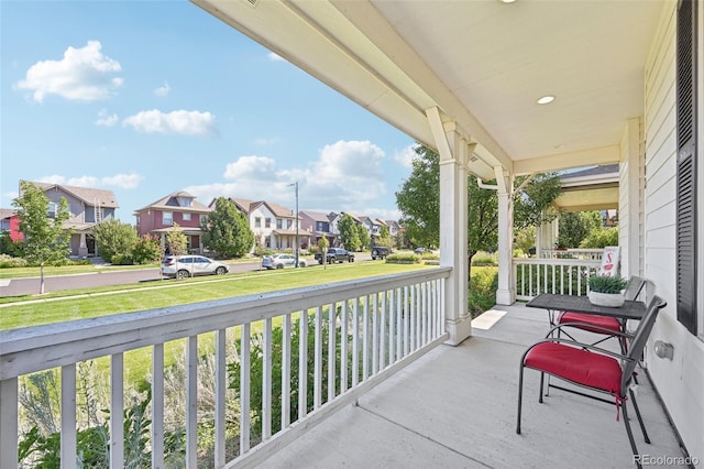 7902 E 49th Pl, Denver, CO 80238 - porch featuring a residential view