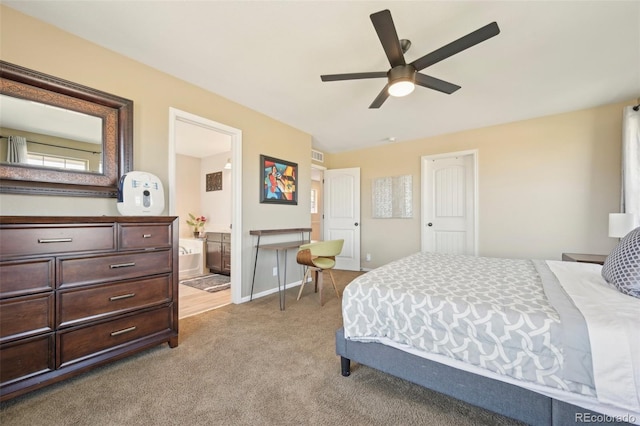 7902 E 49th Pl, Denver, CO 80238 - bedroom featuring carpet floors, ensuite bathroom, and ceiling fan