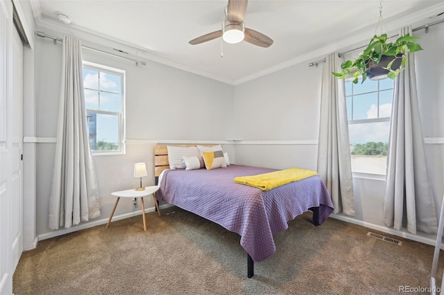 7902 E 49th Pl, Denver, CO 80238 - carpeted bedroom featuring crown molding and a ceiling fan