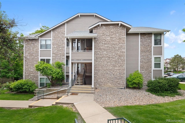 8378 S Upham Way Unit B205, Littleton, CO 80128 - view of front of house with stone siding and stairway