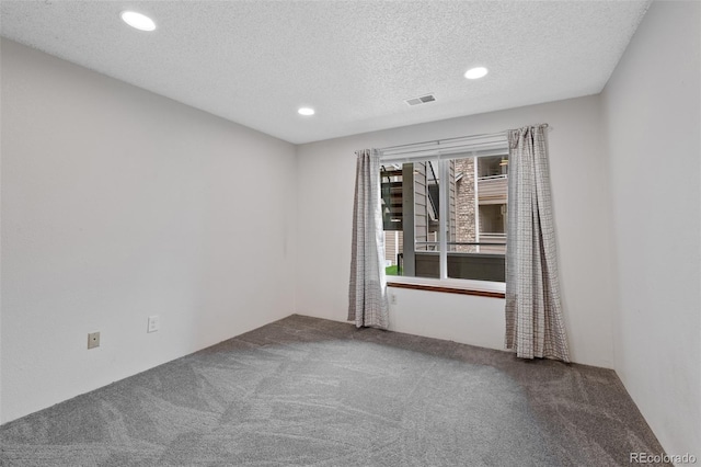 8378 S Upham Way Unit B205, Littleton, CO 80128 - spare room featuring carpet flooring, recessed lighting, and a textured ceiling