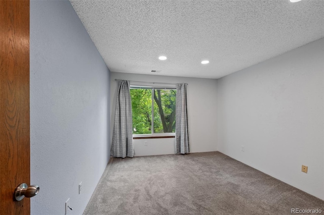 8378 S Upham Way Unit B205, Littleton, CO 80128 - carpeted spare room with a textured ceiling and recessed lighting