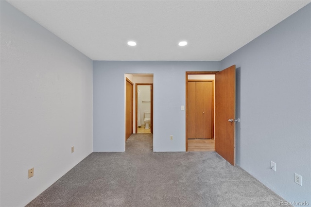8378 S Upham Way Unit B205, Littleton, CO 80128 - unfurnished bedroom with carpet and recessed lighting