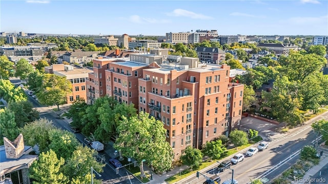 birds eye view of property with a view of city