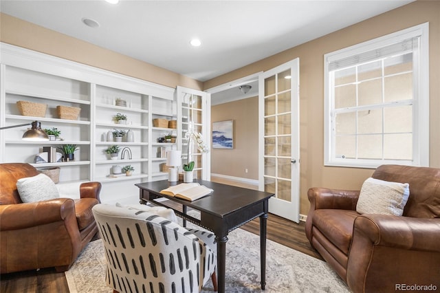 office space with french doors and dark hardwood / wood-style floors