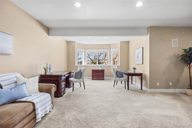 sitting room featuring carpet