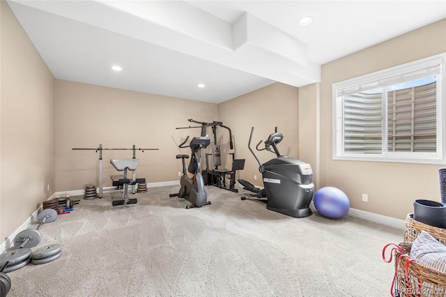 workout area featuring carpet flooring