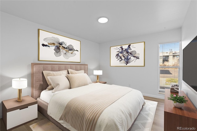 bedroom featuring dark hardwood / wood-style floors