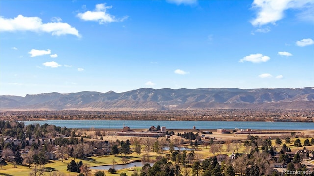 view of mountain feature with a water view