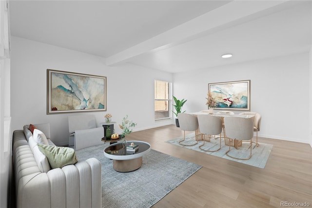 living room featuring recessed lighting, beamed ceiling, baseboards, and wood finished floors