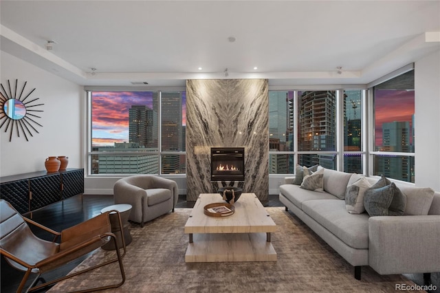 living area with plenty of natural light and a premium fireplace