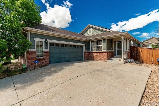 16257 E 105th Cir, Commerce City, CO 80022 - ranch-style house featuring brick siding, a garage, fence, and concrete driveway