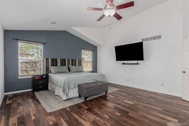 16257 E 105th Cir, Commerce City, CO 80022 - bedroom with multiple windows, wood finished floors, vaulted ceiling, baseboards, and ceiling fan