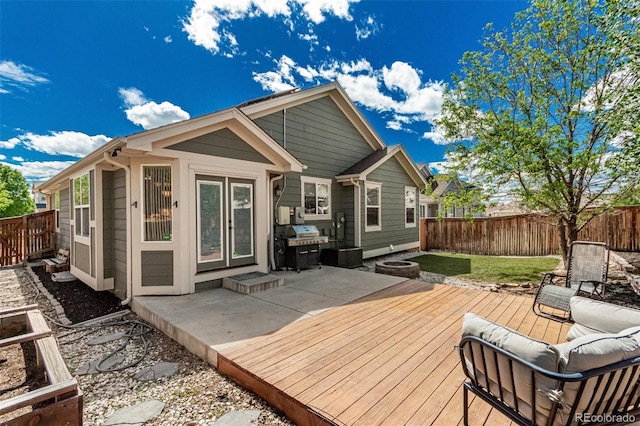 16257 E 105th Cir, Commerce City, CO 80022 - back of house featuring a deck and a fenced backyard