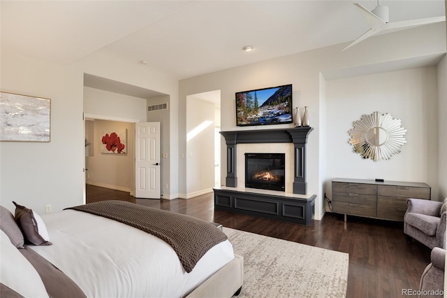 bedroom with dark wood-type flooring