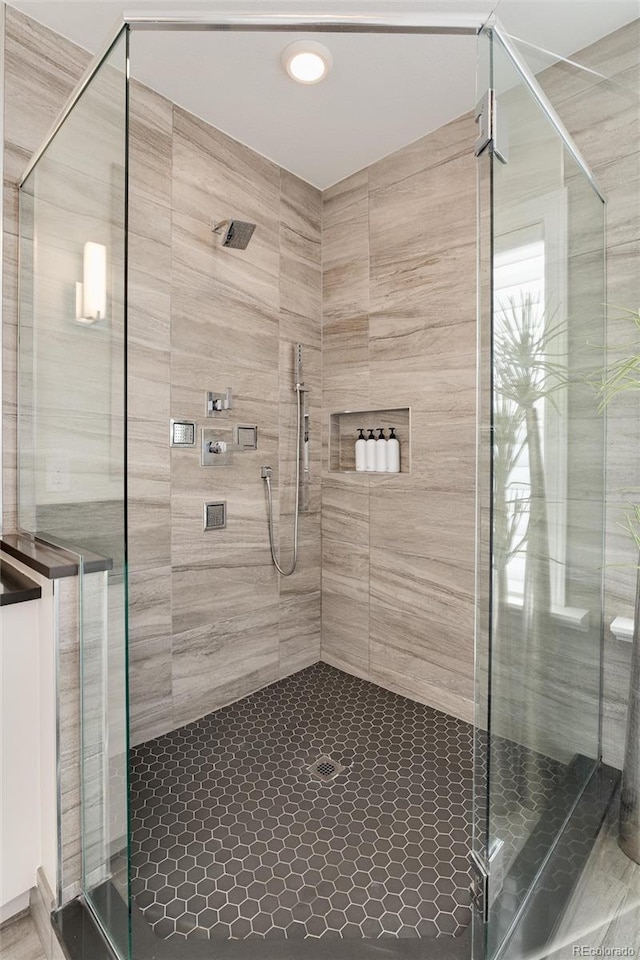 bathroom with an enclosed shower