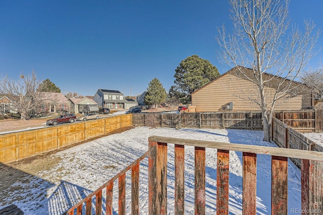 view of yard covered in snow