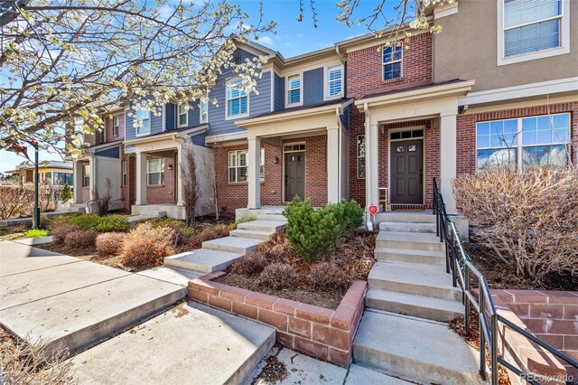 view of front of home with brick siding