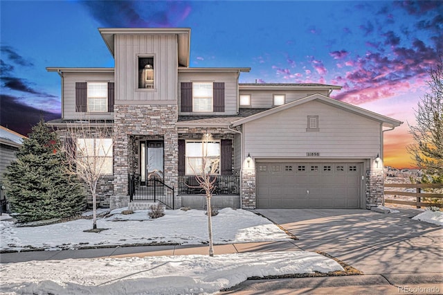 view of front of property with a garage