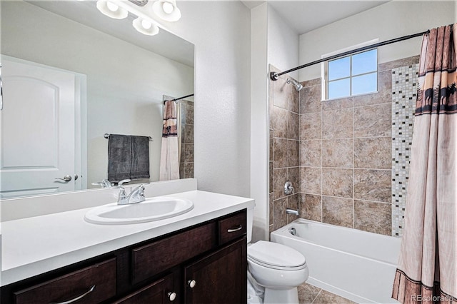 full bathroom featuring toilet, tile patterned floors, vanity, and shower / tub combo with curtain