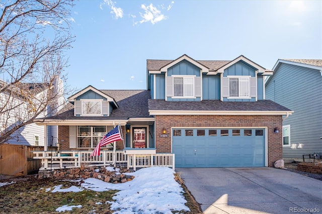 view of front of property featuring brick siding, a porch, concrete driveway, an attached garage, and board and batten siding