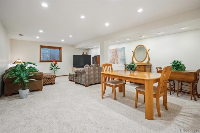 carpeted dining area featuring baseboards and recessed lighting