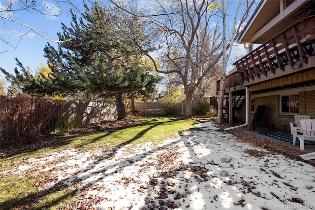 view of yard with stairway, a patio, and a fenced backyard