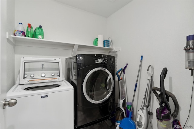 washroom featuring independent washer and dryer