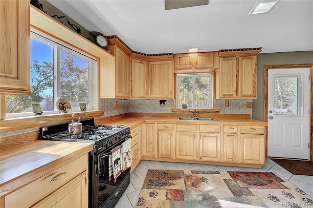 205 Ohler Ct, Jefferson, CO 80456 - kitchen featuring black gas stove, wooden counters, a sink, and light brown cabinetry