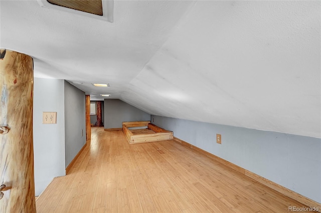 205 Ohler Ct, Jefferson, CO 80456 - additional living space featuring wood finished floors and lofted ceiling