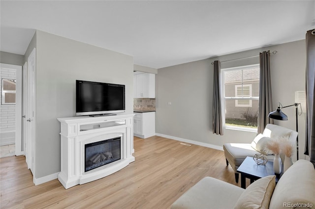 living room featuring light hardwood / wood-style flooring