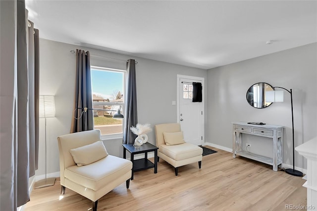 living area featuring light hardwood / wood-style flooring