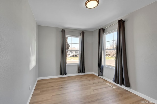 empty room featuring light wood-type flooring