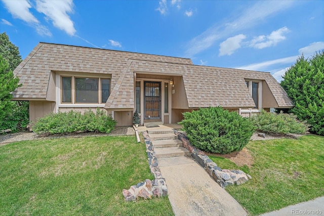 31 Irene Ct, Broomfield, CO 80020 - view of front of house with a front lawn and a shingled roof