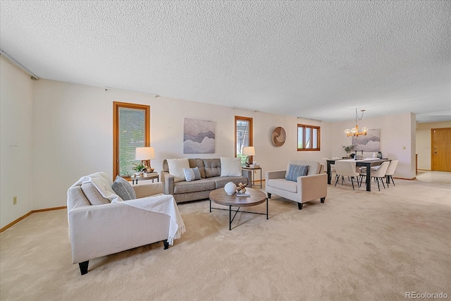 31 Irene Ct, Broomfield, CO 80020 - living area featuring a chandelier, light colored carpet, a textured ceiling, and baseboards
