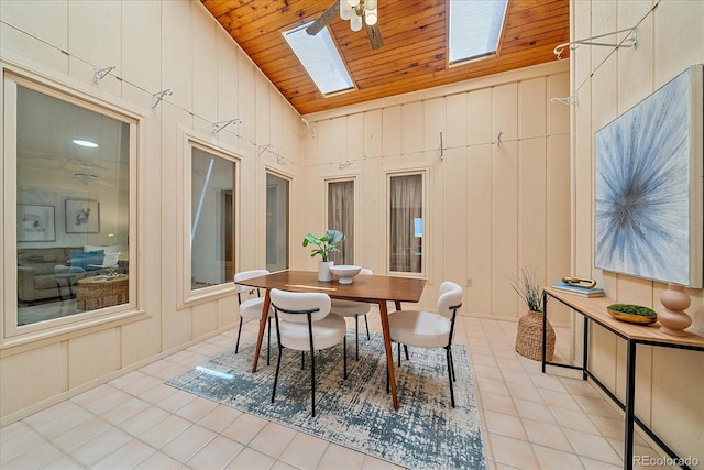 31 Irene Ct, Broomfield, CO 80020 - dining space featuring a skylight, wooden ceiling, ceiling fan, high vaulted ceiling, and light tile patterned floors