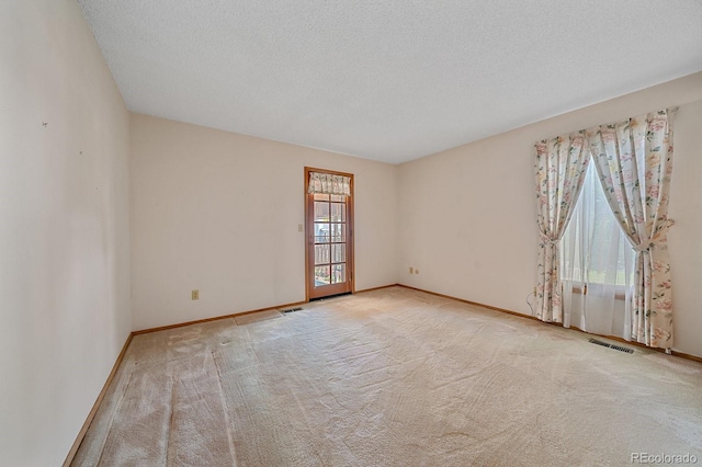 31 Irene Ct, Broomfield, CO 80020 - carpeted spare room with baseboards and a textured ceiling