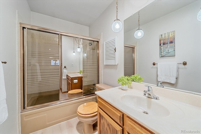 31 Irene Ct, Broomfield, CO 80020 - bathroom with toilet, vanity, and enclosed tub / shower combo