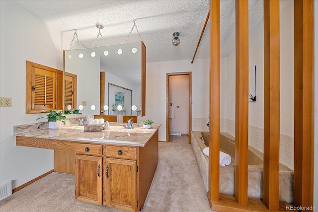 31 Irene Ct, Broomfield, CO 80020 - full bathroom with a tub to relax in, vanity, baseboards, and a textured ceiling