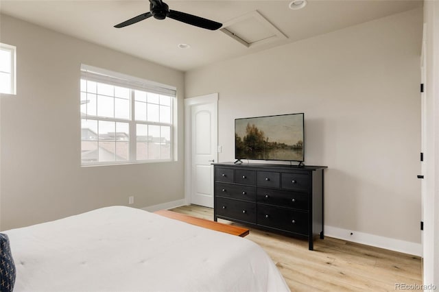 bedroom featuring light wood finished floors, baseboards, recessed lighting, attic access, and a ceiling fan