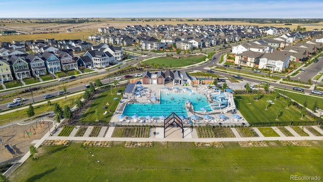 aerial perspective of suburban area with a pool area