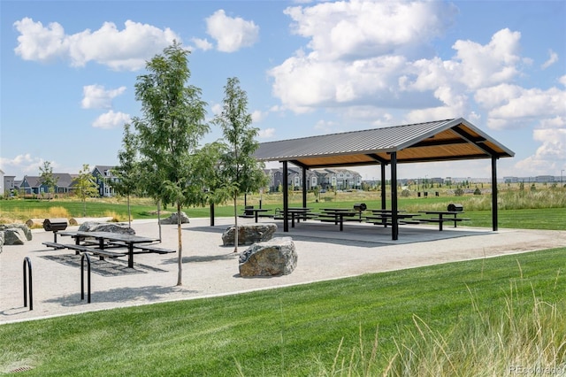 view of home's community with a gazebo and a yard