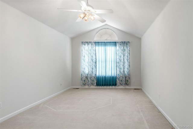 12502 E Harvard Cir, Aurora, CO 80014 - unfurnished room featuring light colored carpet, vaulted ceiling, and a ceiling fan