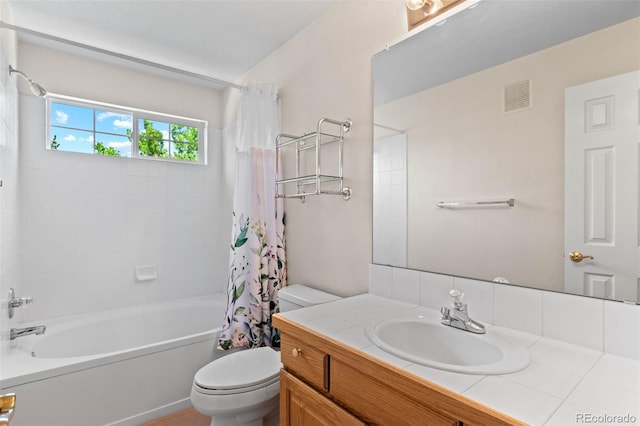 12502 E Harvard Cir, Aurora, CO 80014 - full bathroom featuring vanity and shower / tub combo with curtain