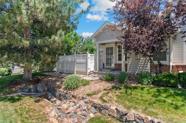 12502 E Harvard Cir, Aurora, CO 80014 - view of front facade featuring brick siding